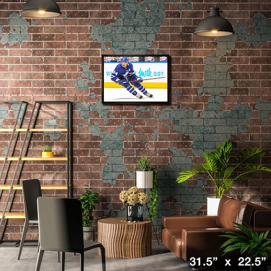 Auston Matthews Toronto Maple Leafs Framed 20" x 29" Skating Canvas 31.5" x 22.5"